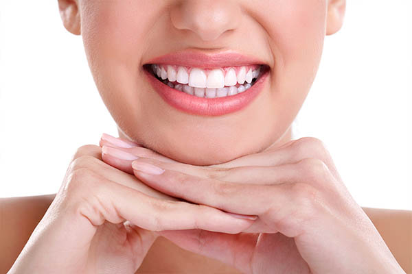 women with white teeth smiling